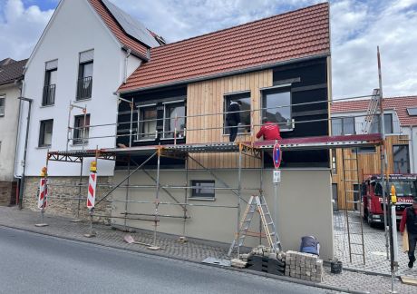IMG 6218 scaled 9206a69c Bauunternehmen Hildebrand: Neubau einer modernen Wohnanlage im Ortskern von Hoch-Weisel